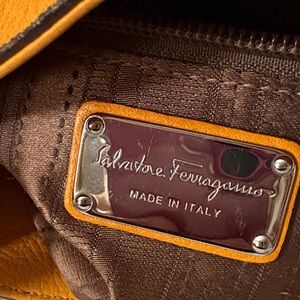 Salvatore Ferragamo cross body mustard colored, Brown adjustable strap Accessory